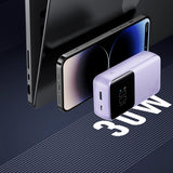 Joyroom JR-PBC06 mini powerbank med indbygget USB-C / Lightning kabler 30W 10000mAh - lilla