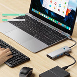 Tech-Protect HB04 HUB Adapter 9in1 USB-C + USB2.0 + USB3.0 + HDMI 4K 60Hz + SD / TF + PD100W + AV3.5 - grå
