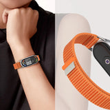 Tech-Protect Nylon Pro Strap til Xiaomi Smart Band 8/9/10/NFC - sort og orange